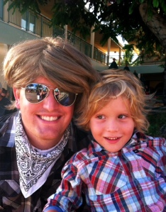 My Husband Chris with a wig on to match Zachy Boy's awesome hair!
